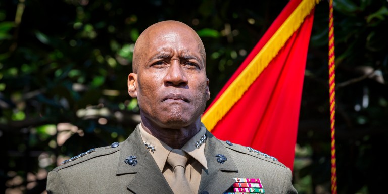 U.S. Marine Corps Gen. Michael E. Langley stands at attention during his promotion ceremony at Marine Barracks Washington, D.C., August 6, 2022. Gen. Langley, who began his career in the Marine Corps as an artillery officer in 1985, is the first Black Marine to be promoted to the rank of General.