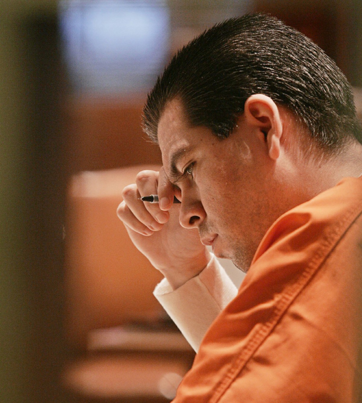 Anthony Sanchez sits in a Cleveland County courtroom during a preliminary hearing in Norman, Okla., Wednesday, Feb. 23, 2005. Sanchez is  accused in the murder of of University of Oklahoma ballet student Jewell "Juli" Busken.  (AP Photo/The Oklahoman, Jaconna Aguirre)