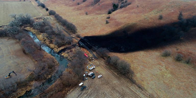In this photo taken by a drone, cleanup continues in the area where the ruptured Keystone pipeline dumped oil into a creek in Washington County, Kan., Friday, Dec. 9, 2022. The Environmental Protection Agency announced Monday, Jan., 9, 2023, that it has reached an agreement with a pipeline operator to clean up a spill that dumped 14,000 bathtubs’ worth of crude oil into a rural Kansas creek. (DroneBase via AP, File)