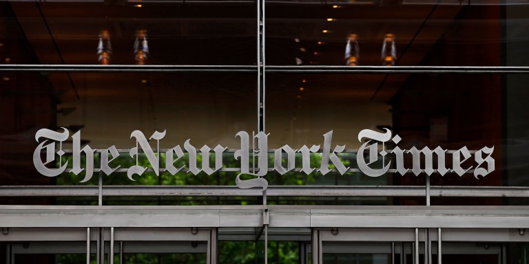 The New York Times logo is displayed outside their building, Tuesday, June 20, 2023, in New York. (Aaron M. Sprecher via AP)