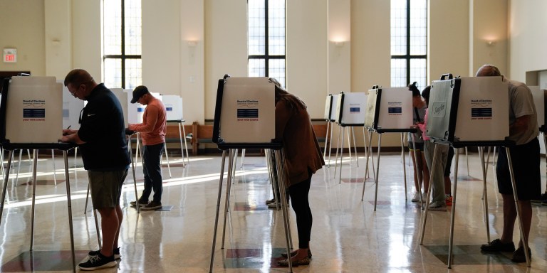 People vote on Election Day, Tuesday, Nov. 7, 2023, at Knox Presbyterian Church in Cincinnati. Polls are open in a few states for off-year elections that could give hints of voter sentiment ahead of next year's critical presidential contest. (AP Photo/Joshua A. Bickel)
