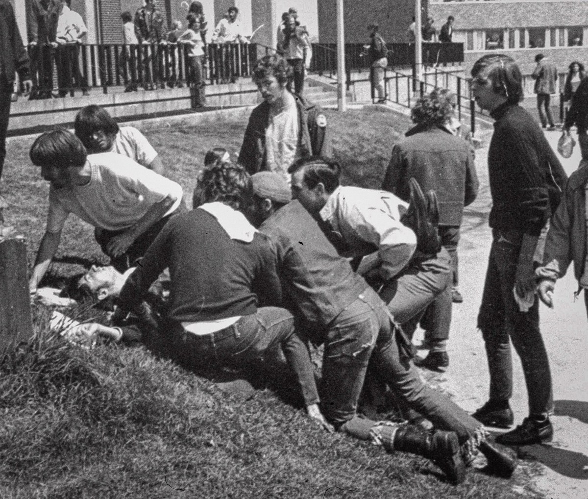 A Kent State University student lies on the ground after National Guardsman fired into a crowd of demonstrators on May 4, 1970 in Kent, Ohio.  (AP Photo)