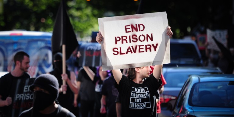 Protesters marched through the streets of Portland, Ore., on September 9, 2016, during a nationwide day of action against prison slavery on the 45th anniversary of the Attica Uprising, which saw the death of twenty-nine prisoners and ten hostages after inmates rioted for better conditions. (Photo by Alex Milan Tracy) *** Please Use Credit from Credit Field ***