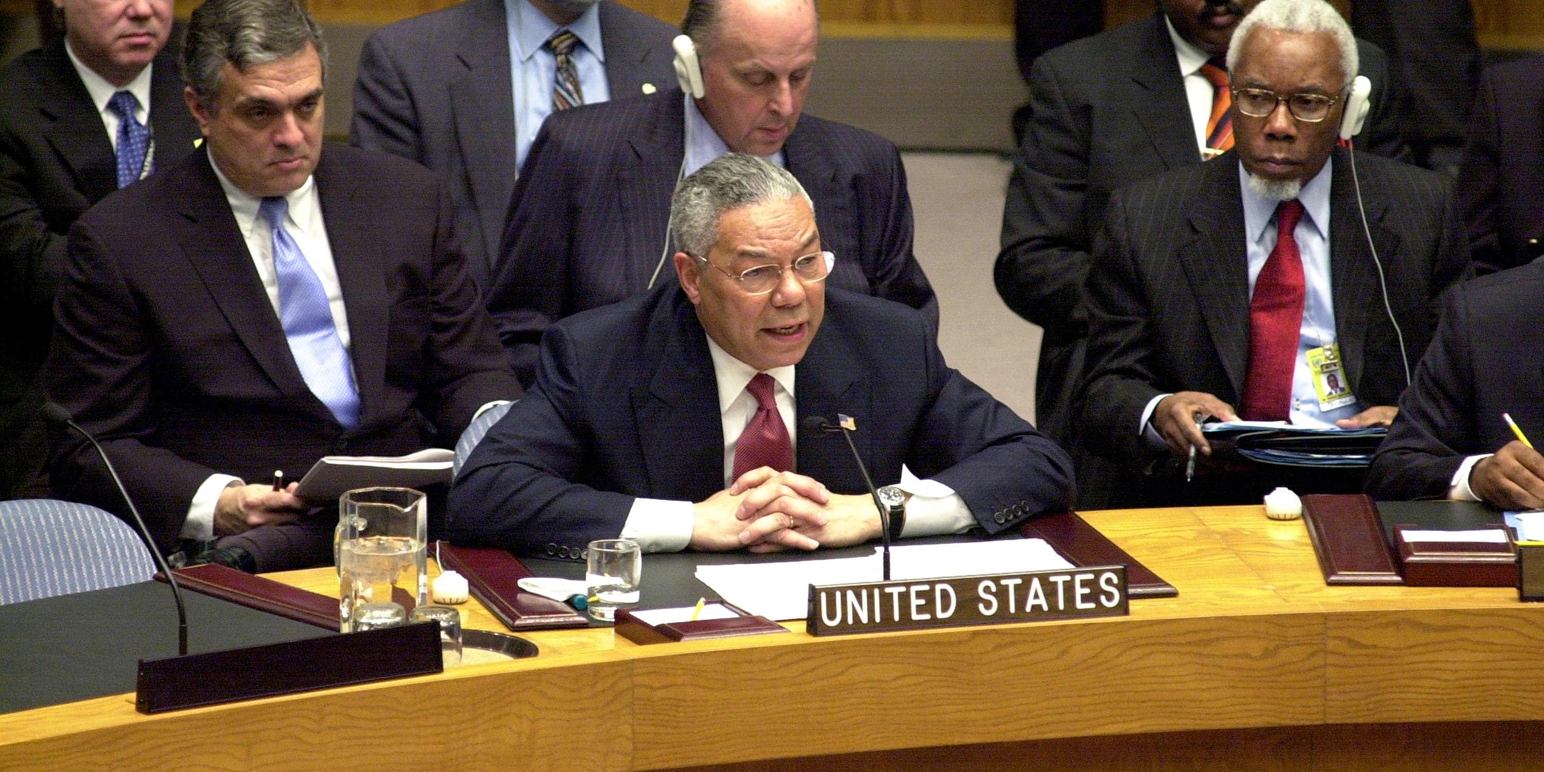 UNITED STATES - FEBRUARY 05:  Secretary of State Colin Powell addresses the United Nations Security Council. Wielding dramatic satellite photos and intelligence intercepts, he cited "irrefutable and undeniable" evidence that Iraq still conceals massive quantities of terror weapons. Seated in the row behind Powell, is CIA Director George Tenet (left).  (Photo by Thomas Monaster/NY Daily News Archive via Getty Images)