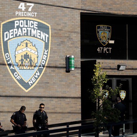 Police officers stand in front of the 47th precinct, near the scene of a fatal shooting of a New York City police officer in the Bronx borough of New York, Sunday, Sept. 29, 2019.  (AP Photo/Seth Wenig)
