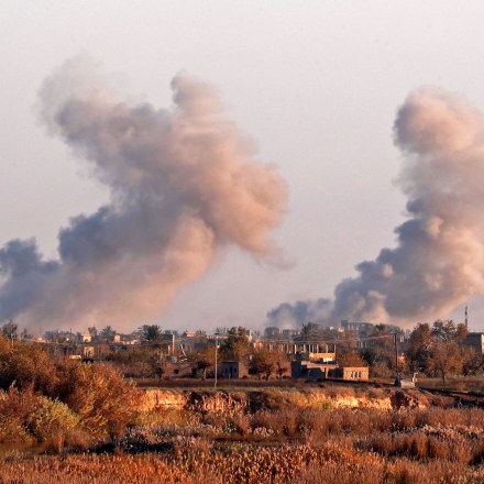 Smoke billows after bombings in the Deir Ezzor province, near Hajin, eastern Syria, on December 15, 2018. - Kurdish-led forces seized the Islamic State's main hub of Hajin on December 14, a milestone in a massive and costly US-backed operation to eradicate the jihadists from eastern Syria. The Syrian Democratic Forces secured Hajin, the largest settlement in what is the last pocket of territory controlled by IS, the Syrian Observatory for Human Rights said. (Photo by Delil SOULEIMAN / AFP)        (Photo credit should read DELIL SOULEIMAN/AFP/Getty Images)