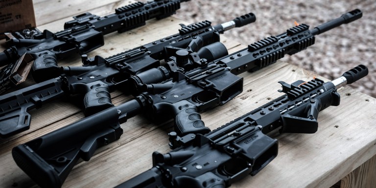GREELEY, PENNSYLVANIA - OCTOBER 12: AR-15 rifles and other weapons are displayed on a table at a shooting range during the “Rod of Iron Freedom Festival” on  October 12, 2019 in Greeley, Pennsylvania. The two-day event, which is organized by Kahr Arms/Tommy Gun Warehouse and Rod of Iron Ministries, has billed itself as a “second amendment rally and celebration of freedom, faith and family.” Numerous speakers, vendors and displays celebrated guns and gun culture in America.  (Photo by Spencer Platt/Getty Images)