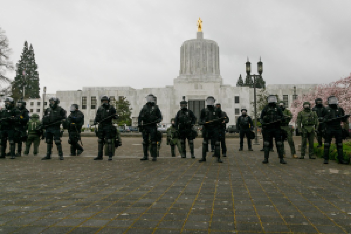 OREGON, USA - MARCH 28 : More than a hundred anti-fascist activists, Black Bloc, and anarchists are gathered on March 28, 2021 at Salem, Oregonâs State Capitol building to oppose a group of Trump, right-wing, Proud Boy and Qanon supporters who drove to the Capitol, in Oregon, United States. (Photo by John Rudoff/Anadolu Agency via Getty Images)