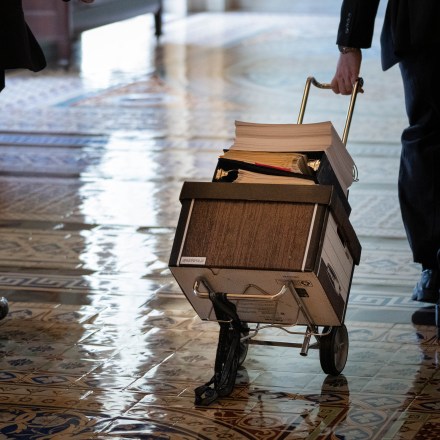 WASHINGTON, DC - AUGUST 02:  Documents, including text of the bipartisan infrastructure legislation, is wheeled toward the office of Senate Majority Leader Chuck Schumer (D-NY) at the U.S. Capitol on August 2, 2021 in Washington, DC. The bipartisan group of senators finalized the legislative text of the $1 trillion infrastructure bill over the weekend and will now move on to the amendments process this week. The legislation will fund projects for improvements to roads, bridges, dams, climate resiliency and broadband internet. (Photo by Drew Angerer/Getty Images)