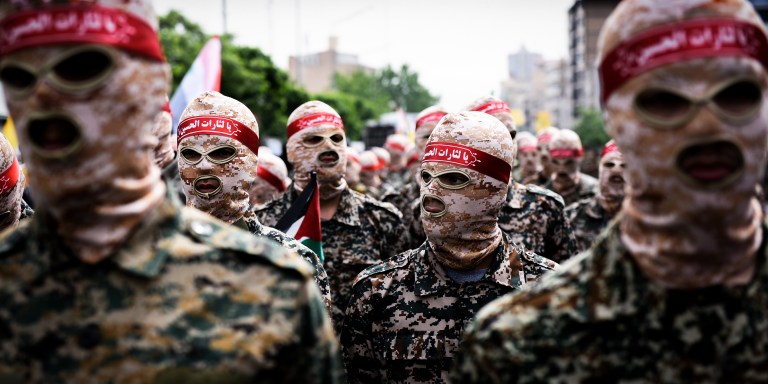 TEHRAN, IRAN - 2022/04/29: Islamic Revolutionary Guard Corps (IRGC) members march during the annual pro-Palestinians Al-Quds or Jerusalem Day rally in Tehran. (Photo by Sobhan Farajvan/Pacific Press/LightRocket via Getty Images)