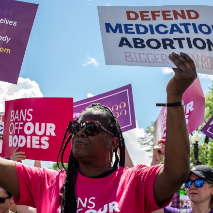 WASHINGTON, DISTRICT OF COLUMBIA, UNITED STATES - 2023/04/15: Activists holding abortion rights signs shout slogans during a rally.  Abortion rights activists rallied  outside the US Supreme Court in Washington, DC.  On April 14, the Court temporarily preserved access to mifepristone, a widely used abortion pill, in an 11th-hour ruling preventing lower court restrictions on the drug from coming into force. (Photo by Probal Rashid/LightRocket via Getty Images)