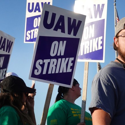 EAST MOLINE, ILLINOIS - OCTOBER 14: Workers picket outside of John Deere Harvester Works facility on October 14, 2021 in East Moline, Illinois. More than 10,000 Deere employees represented by the UAW walked off the job at midnight after failing to agree to term of a new contract. About 1,400 workers walked off the job at the Harvester Works plant where the company builds combines.  (Photo by Scott Olson/Getty Images)