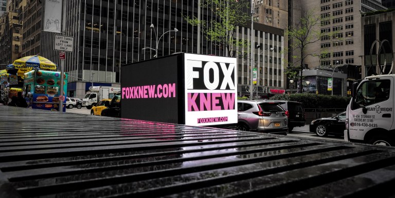 NEW YORK, NEW YORK - APRIL 17: A mobile billboard deployed by Media Matters circles Fox News Corp headquarters on April 17, 2023 in New York City. The media watchdog group, Media Matters, deployed mobile billboards outside Fox News Corp HQs in NY calling out Fox News for reporting false claim about Dominion voting machines as the Fox/Dominion defamation trial begins in Wilmington, Delaware.  (Photo by Ilya S. Savenok/Getty Images for Media Matters)