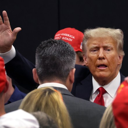 GRIMES, IOWA - JUNE 01: Former President Donald Trump greets supporters at a Team Trump volunteer leadership training event held at the Grimes Community Complex on June 01, 2023 in Grimes, Iowa. Trump delivered an unscripted speech to the crowd at the event before taking several questions from his supporters.  (Photo by Scott Olson/Getty Images)