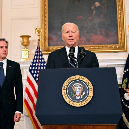 US President Joe Biden, with Secretary of State Antony Blinken, addresses the attacks in Israel from the State Dining Room of the White House in Washington, DC, on October 7, 2023. Palestinian militant group Hamas launched a surprise large-scale attack against Israel Saturday, firing thousands of rockets from Gaza and sending fighters to kill or abduct people as Israel retaliated with devastating air strikes. (Photo by Jim WATSON / AFP) (Photo by JIM WATSON/AFP via Getty Images)