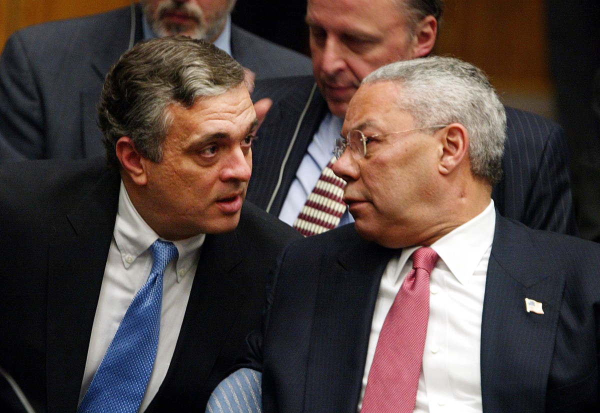 NEW YORK - FEBRUARY 5:  CIA Director George Tenet (L) and U.S. Secretary of State Colin Powell speak following Powell's address to the UN Security Council February 5, 2003 in New York City. Powell made a presentation attempting to convince the world that Iraq is deliberately hiding weapons of mass destruction. (Photo by Mario Tama/Getty Images)