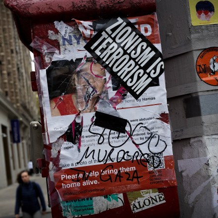 NEW YORK, NEW YORK - NOVEMBER 7: A kidnapped poster for hostages kidnapped on October 7 by Hamas in Israel is torn and covered with an anti_Israel sticker, November 7, 2023, in Greenwich Village, New York City, New York. (Photo by Andrew Lichtenstein/Corbis via Getty Images)